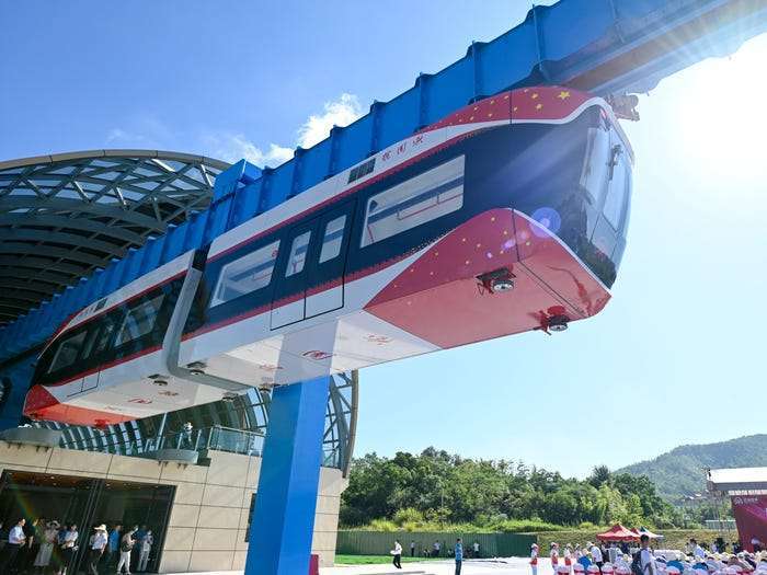 Photo News:China’s new ‘air train’ runs using an overhead magnetic track, never touching it as it glides through the air 30 feet above the ground — see photos
